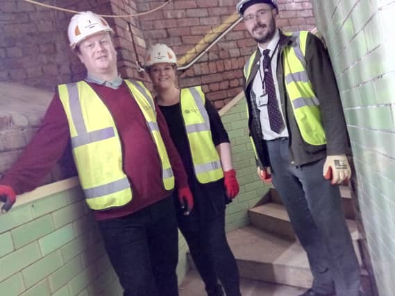 Rachel and David Cook walking up the heritage stairs at the new museum, part of the former girls grammar school