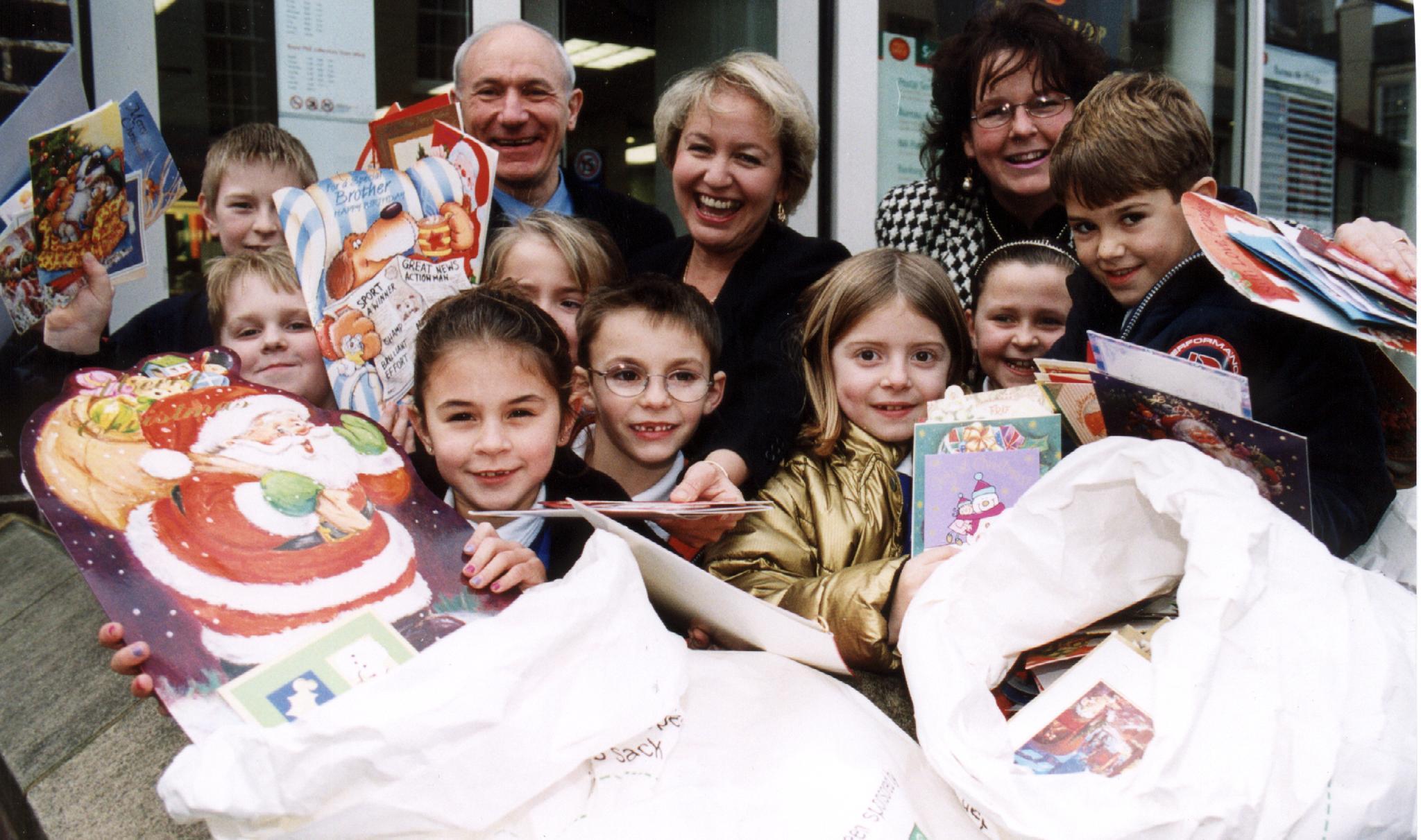 Teacher Tony Germy, of Richmond Hill Middle School, Doncaster Central MP Rosie Winterton, and teacher Rosie Baldock, of Balby Carr Central Primary School, are pictured with their used Christmas cards.