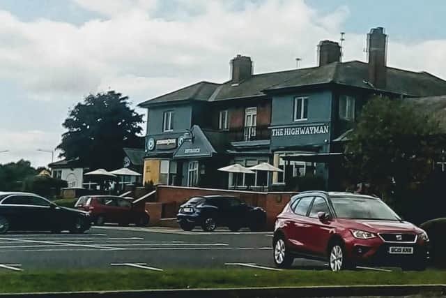 Several windows have been boarded up at The Highwayman.