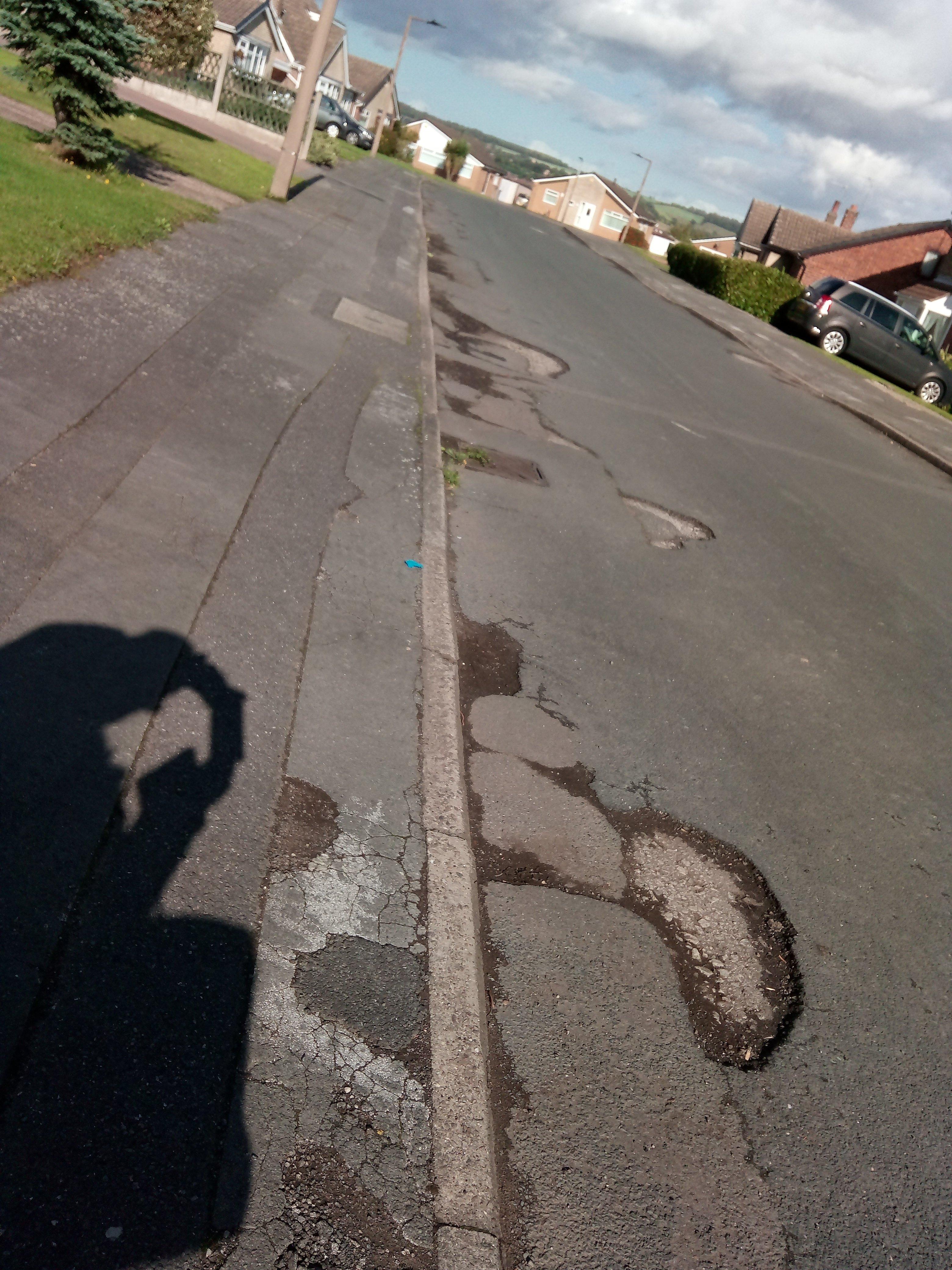 One of the many pot holes on Chepstow Drive, Mexborough