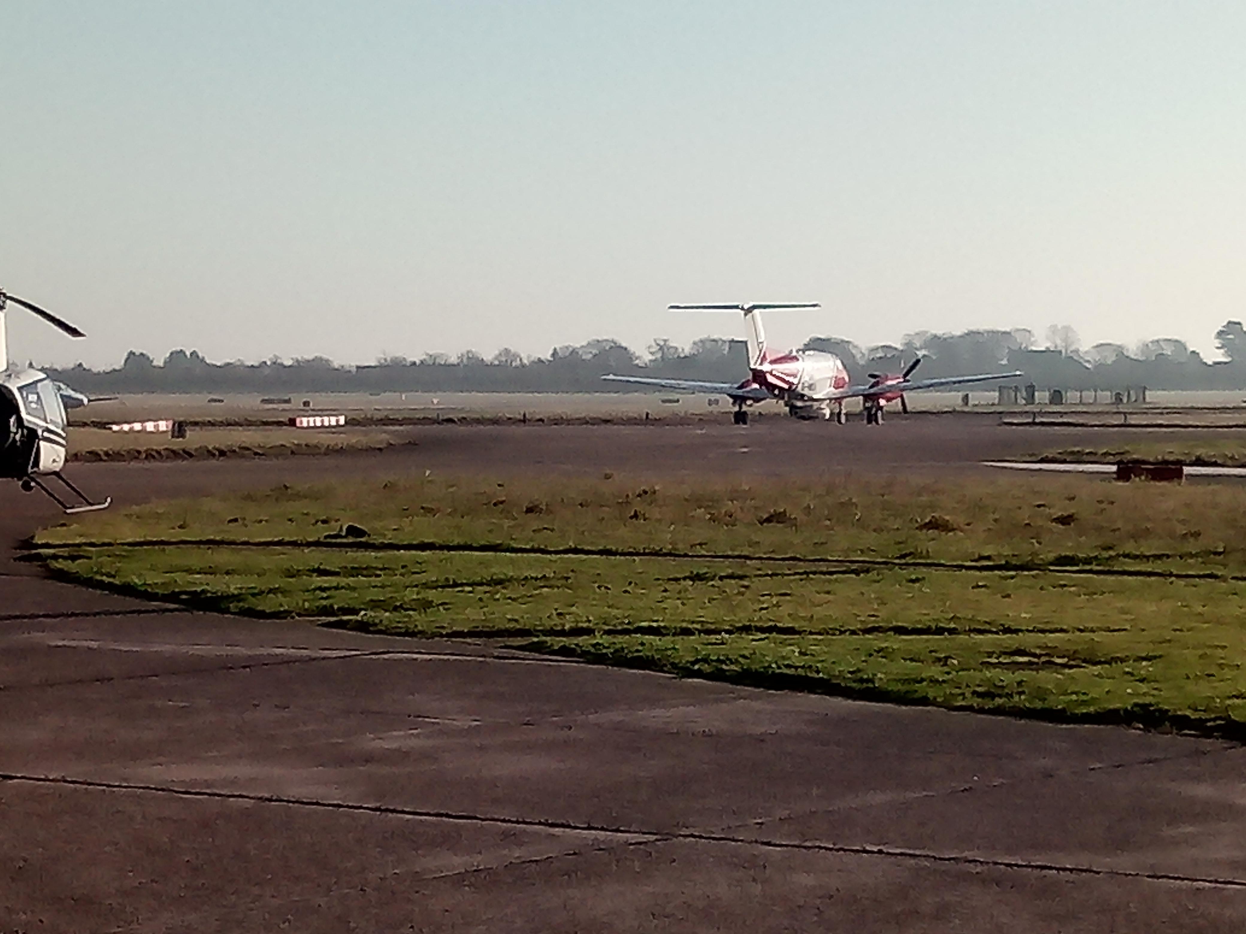 The Maritime and Coastguard Agency's Beechcraft King Air B200 makes its way down the runway after being scrambled at Doncaster.