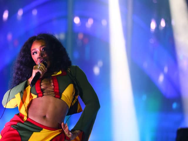 Grammy-award-winner SZA is set to close out the Pyramid Stage on Sunday as Glastonbury Festival 2024 draws to a close (Credit: Getty Images)
