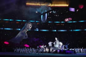  AL KHOR, QATAR - NOVEMBER 20: Qatar World Cup mascot La'eeb is seen while dancers perform during the opening ceremony prior to the FIFA World Cup Qatar 2022 Group A match between Qatar and Ecuador at Al Bayt Stadium on November 20, 2022 in Al Khor, Qatar. (Photo by Lars Baron/Getty Images)