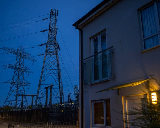 Insulators on an electricity sub station are seen near homes on October 19, 2022 in Manchester, England. The British utility company, National Grid,  have said that UK households may face power cuts this winter for up to three hours at a time, if gas supplies run low. The UK relies heavily on gas to produce electricity, and gas supplies to Europe have been severely disrupted by the fallout from Russia's invasion of Ukraine. (Photo by Christopher Furlong/Getty Images)