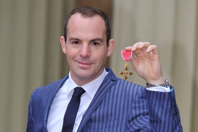 Martin Lewis with his Order of the British Empire (Getty Images)