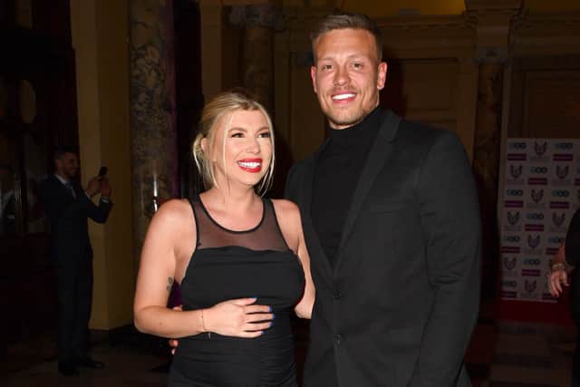 Olivia (L) and Alex Bowen (R) have become a Love Island success story, after getting engaged a year after meeting on the show. (Photo by Anthony Devlin/Getty Images)