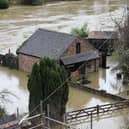 Houses in Ironbridge surrounded by flood waters as River Severn levels started to rise following heavy rain.