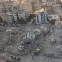 An aerial view of work machines and diggers at the site of collapsed buildings on February 16, 2023 in Hatay, Turkey