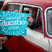 A driver supporting the NEU strike action (Photo: Getty)