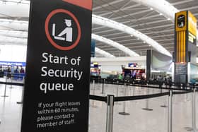 A sign indicating the start of the security queue during a strike by security workers at London Heathrow Airport in London, UK, on Friday, March 31, 2023. IAG SAsÂ British AirwaysÂ is set to scrap 320 flights during the Easter week as security workers strike for 10-days over pay. Photographer: Chris Ratcliffe/Bloomberg via Getty Images