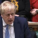 Prime Minister Boris Johnson delivers a statement to MPs in the House of Commons on the Sue Gray report (PA)