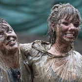 Muddy festival goers at Glastonbury will be able to get a free shower this year