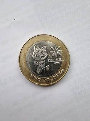 The £2 coin features the official mascot of the games, Tosha the Cat, as well as the logo of the games.