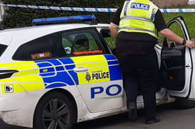 Concerns raised as South Yorkshire Police admit data loss including body cam data. File picture shows South Yorkshire Police officer at an incident. Picture: David Kessen, National World