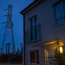 Insulators on an electricity sub station are seen near homes in Manchester.