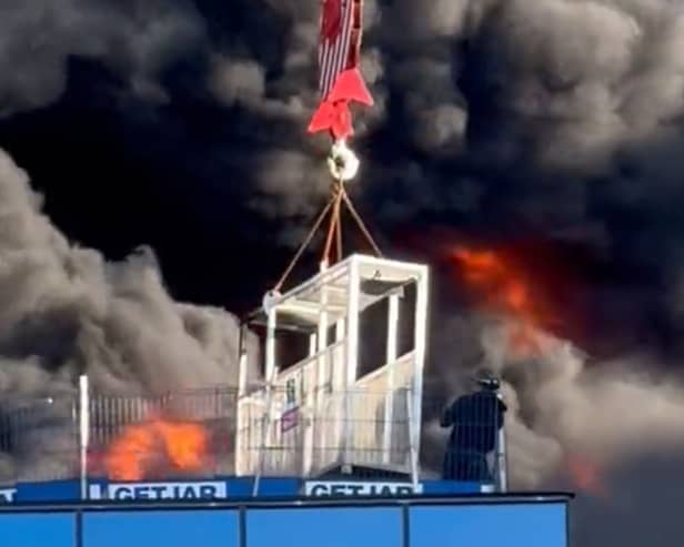 A workman was lifted to safety after a huge fire at a high-rise building in Reading. (Credit: Chris Lauder/X/PA Wire