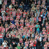 Doncaster Rovers players are reported to have hitched a lift with fans after their matchday bus broke down. File picture, by Steve Parkin, shows Doncaster Rovers fans at a match