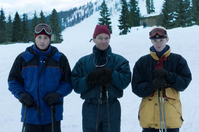 Dominic West as Prince Charles in Netflix show The Crown. He is pictured with fellow actors Ed McVey (Prince William) and Luther Ford (Prince Harry)