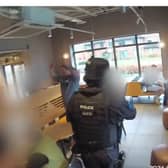 armed police arrest man in Starbucks