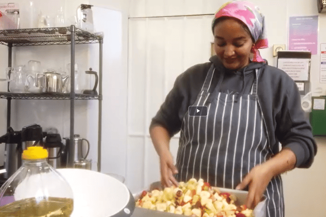 One of the Kitchen of Hope chefs cooking a meal