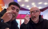 Callum Ryan and his dad Darren Ryan trying 'London's hottest curry' at Aladin in Brick Lane.