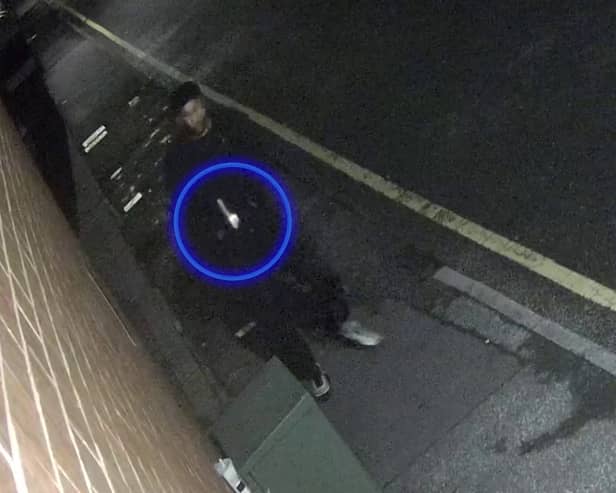 Man caught on CCTV with weapon before stabbing man in unprovoked attack.