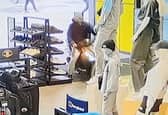 Kavan Conroy captured on CCTV riding a moped in JD sports.  