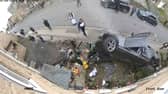 Dramatic moment speeding car ploughs into house before occupants flee scene