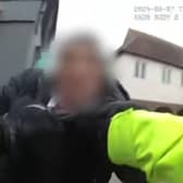 PC Ryan McNamara arrests James Happer.