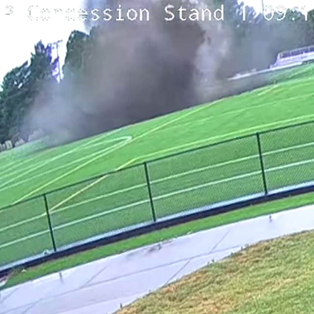 A massive sinkhole opened up and swallowed a light pole in the middle of a football pitch at Gordon Moore Park in Alton, Illinois, USA.