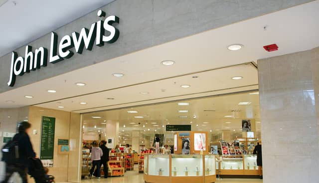 John Lewis profits rise.