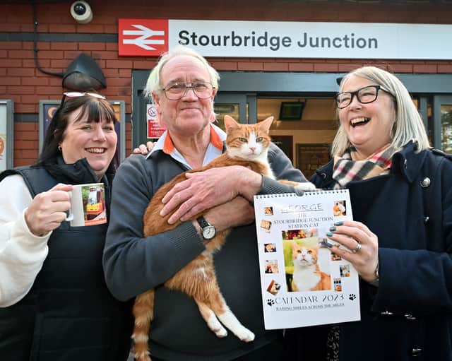 George the station cat with supervisor Ian Tomlinson, Jo Thorpe who owns Olivia Mae Creations and station manager Simone Carter.