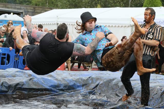 Hundreds of revellers descended on a pub garden to watch the world gravy wrestling championships.