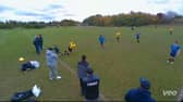 Reggie, 12, accidentally being slide tackled by non-league footballer Terry.