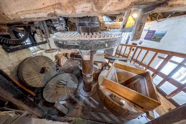Worsbrough Mill workings including the upright oak shaft that drives the mill’s mechanism which needs to be replaced.
