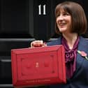 Rachel Reeves poses with the red Budget Box as she leaves 11 Downing Street to present the government's annual Autumn budget to Parliament (Photo: JUSTIN TALLIS/AFP via Getty Images)