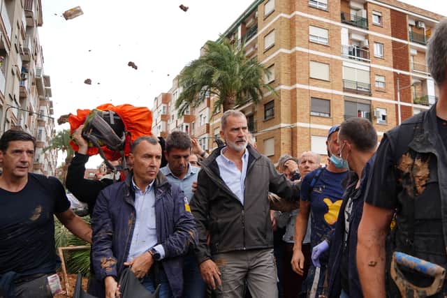 The King and Queen of Spain were pelted with mud while visiting the flood-hit town Valencia. (Photo: AFP via Getty Images)