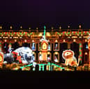 Chatsworth House is now ready and open for the public to enjoy its Christmas theme. Pictured is the front of the house with a light projection of a scene from the story Henry And The Lion's Christmas Feast.