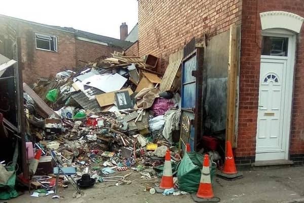 The huge mountain of rubbish has built up at a property in Dalkeith Street