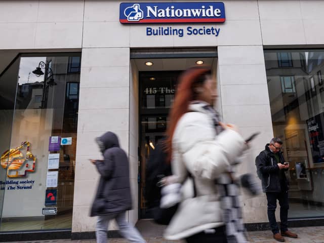 Members of the public walk past the Nationwide Building Society in London (Photo: Dan Kitwood/Getty Images)