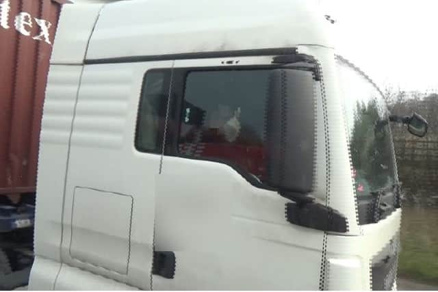 A driver swearing at police after realising he had been caught not wearing his seatbelt