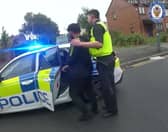 This is the dramatic moment two student police officers chased down a rapist in the street after he attacked a woman in a park. 