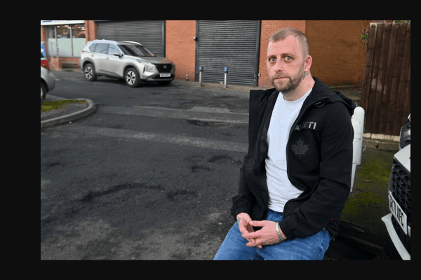 Ben Day, whose brand new car received around £1,900 worth of damage when it hit a pothole in Halesowen. Photo: Steve Leath