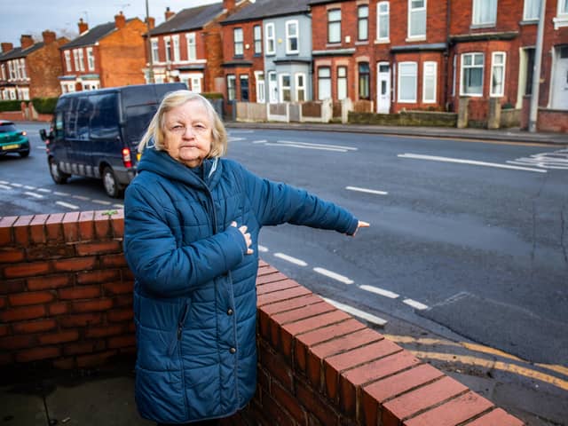 Freda Smith, 73, pictured outside her house on Liverpool Road in Eccles, Greater Manchester