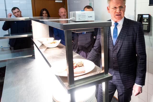 Gordon Ramsay in the kitchen with staff on a visit to his restaurant at Ibrox stadium