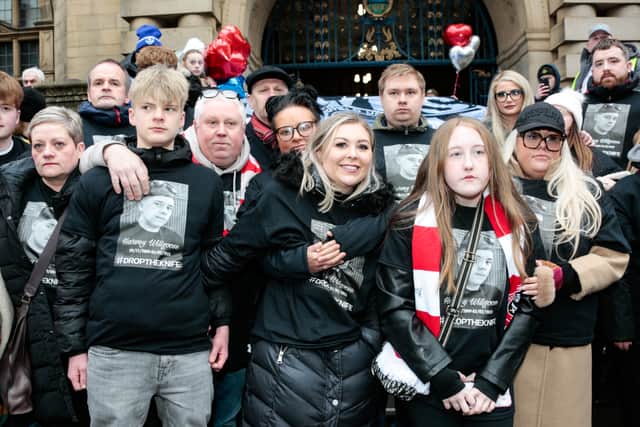 The family of Harvey Willgoose on the steps of Sheffield Town Hall
