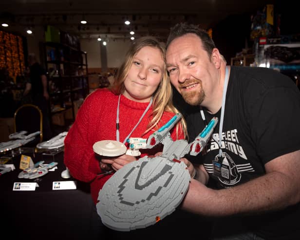 Dean Tomlinson with his daughter Ella, 11, sharing an impressive Star Trek themed LEGO collection