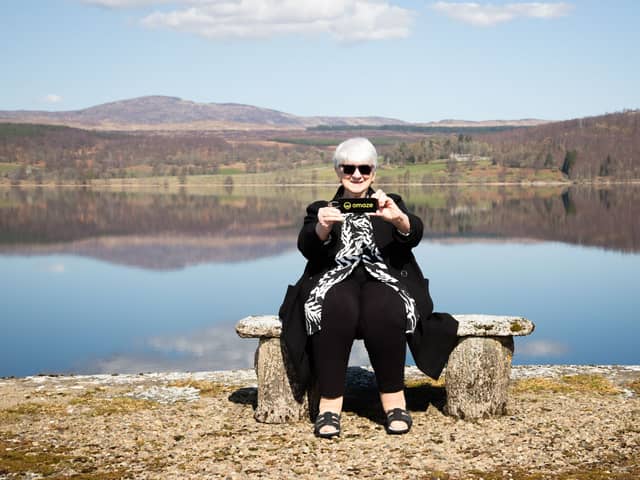 Patricia Moule,  Omaze Winner outside her new £4m home in Scotland.