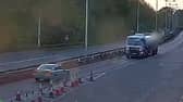 Driver travels towards oncoming traffic on dual carriageway.