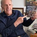 Brian Elliott with his book Miners And The Great War